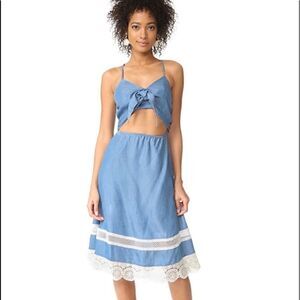 Lovers and friends denim dress with front cut out and tie and lace trim
